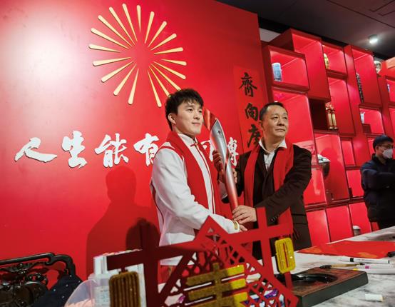 体育文化贺新春：齐广璞现场写福送福并传递冬